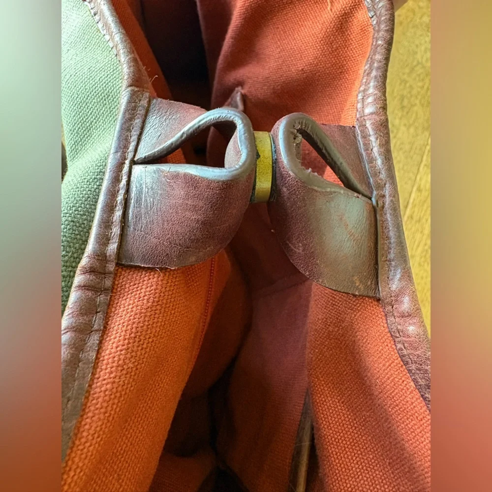Vintage Eddie Bauer, green canvas w/leather trim handles/bottom top snap closure